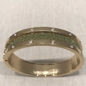 Gold and sparkly green bracelet